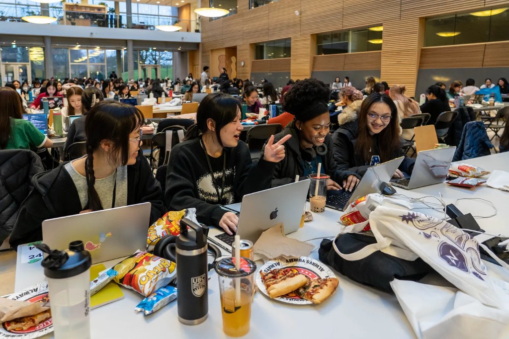 Team collaborating at cmd-f 2025 hackathon
